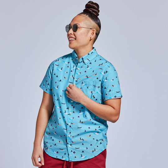 Androgynous button-up shirt in blue surfer print