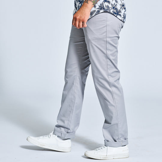 Gender neutral chinos in gray shot from the side. Made in USA by Kirrin Finch