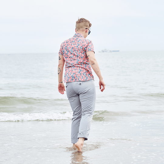 Androgynous Fashion Gray Chinos being worn at the beach