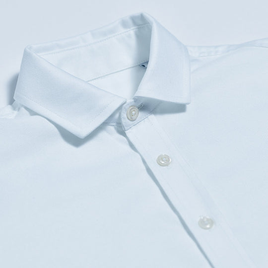 Structured collar on white dress shirt for women
