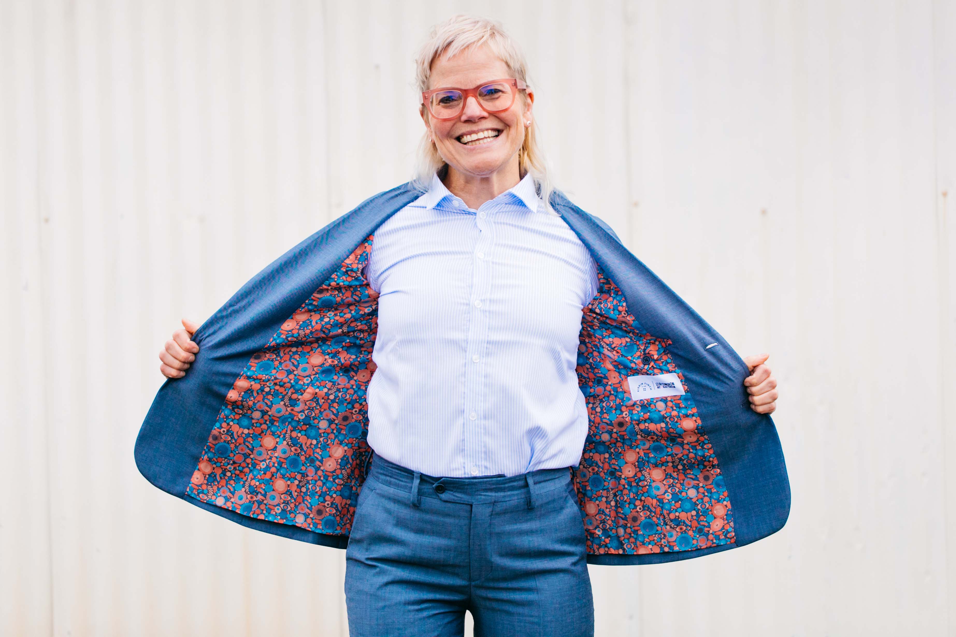 Lisa Congdon in special edition Lisa Congdon slate blue Georgie suit.