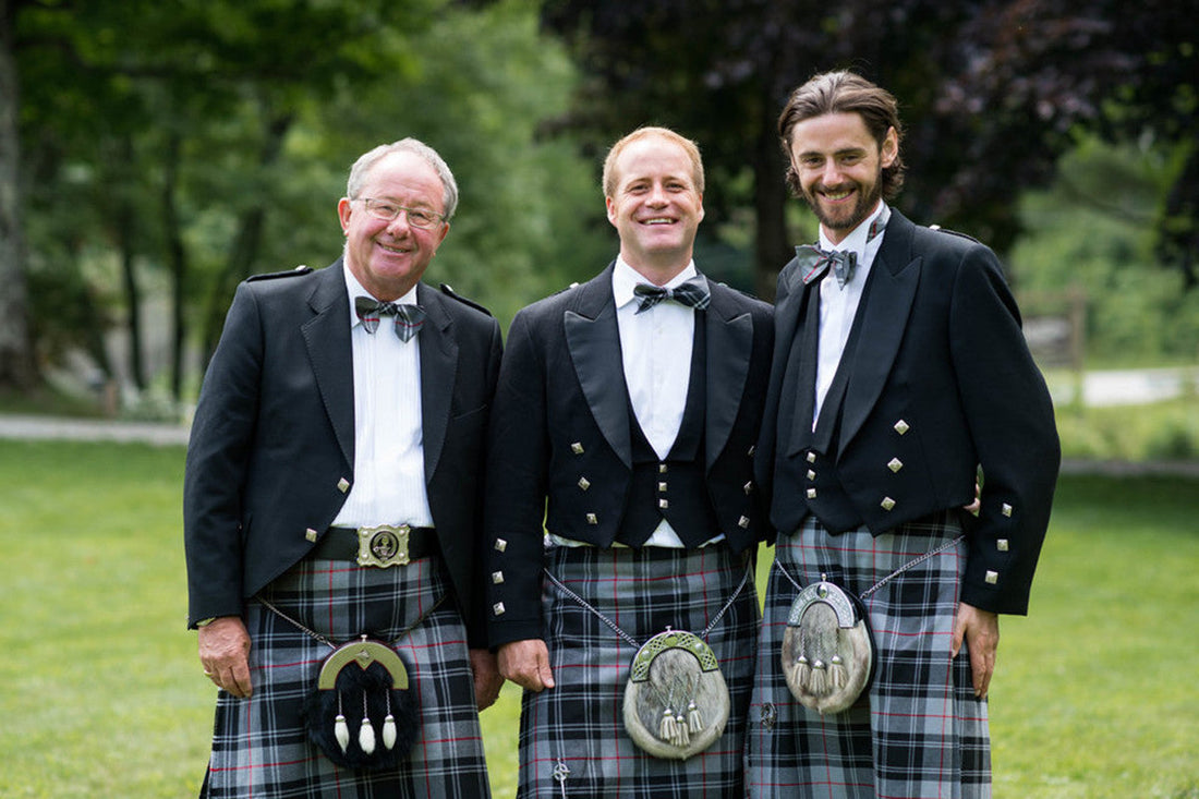 Lauras Dad, brother and cousin wearing formal wear.