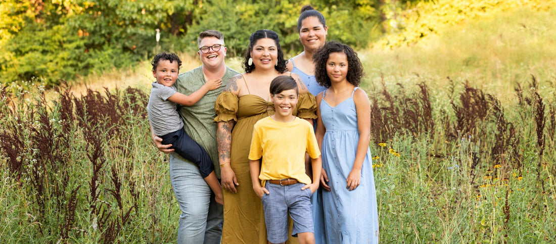 Dapper scout Mo Banks and their family