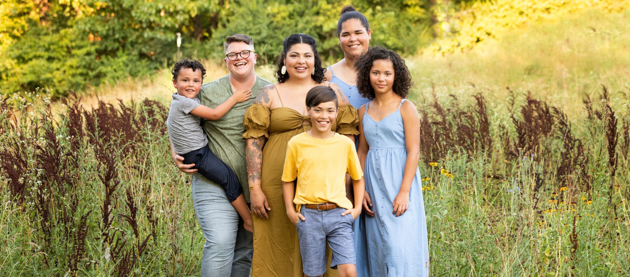 Dapper scout Mo Banks and their family