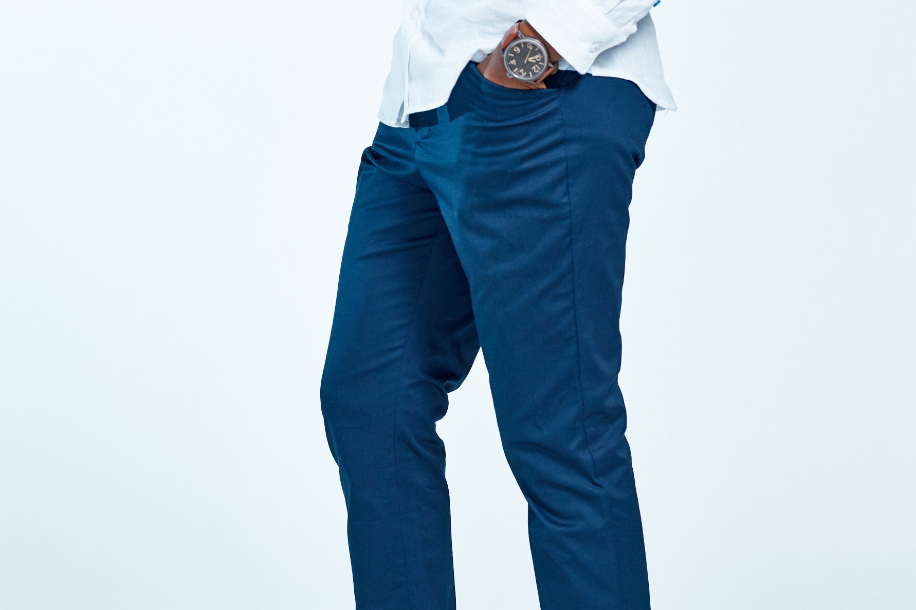 Model wearing blue pants.
