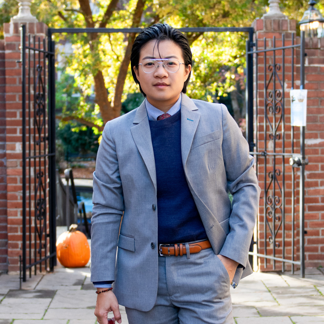 non-binary suiting with navy wool sweater by Kirrin Finch