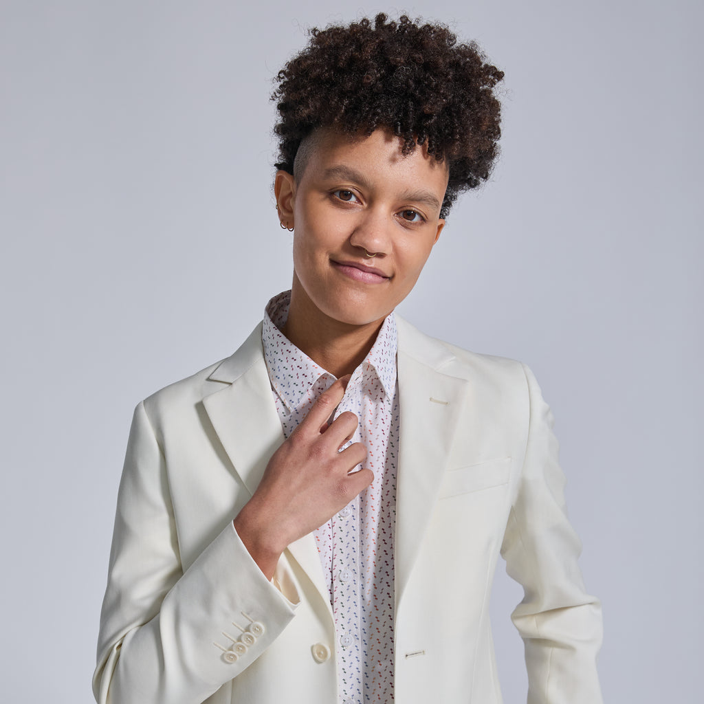 All white wedding suit with confetti short sleeve shirt for women, trans, masc, and non-binary folk