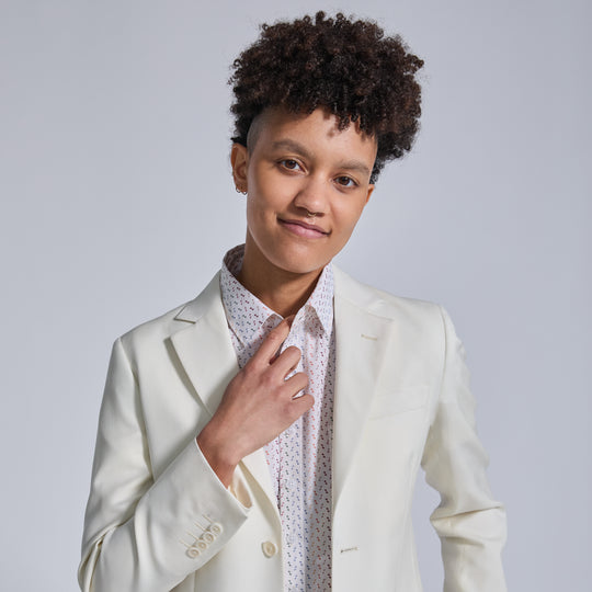 All white wedding suit with confetti short sleeve shirt for women, trans, masc, and non-binary folk