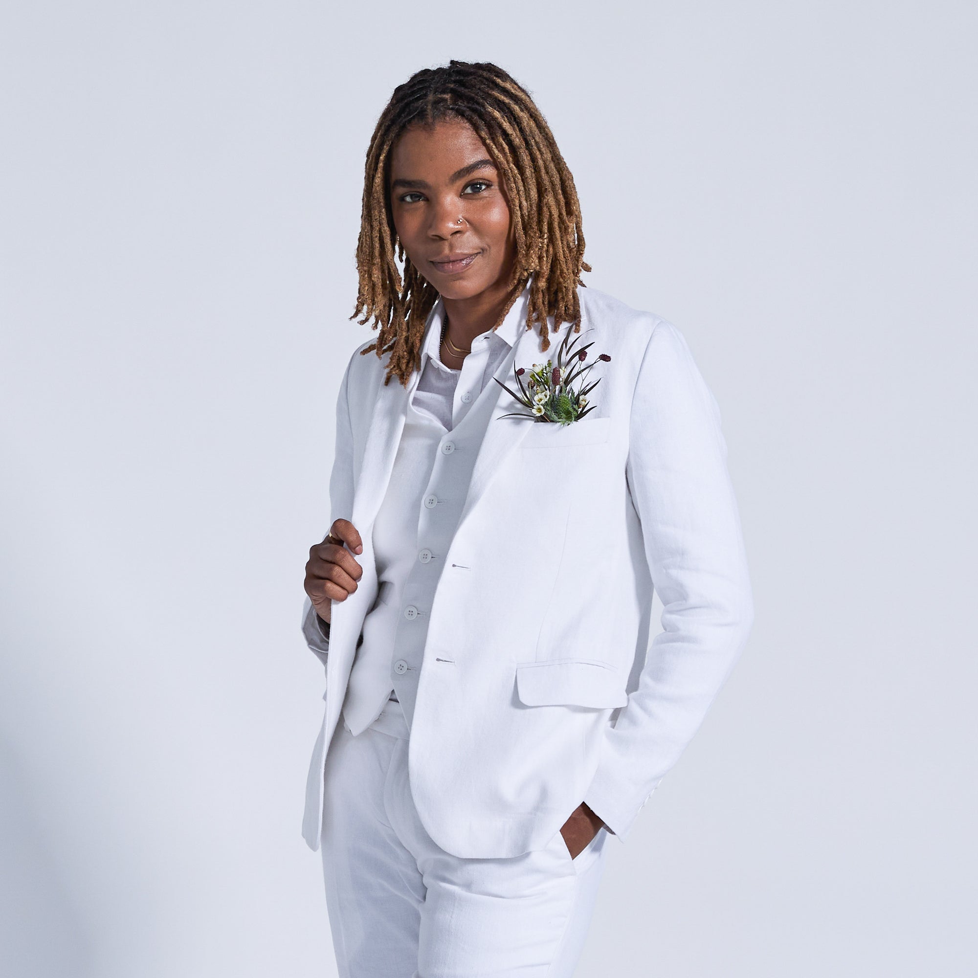 Androgynous White Sand linen blazer.