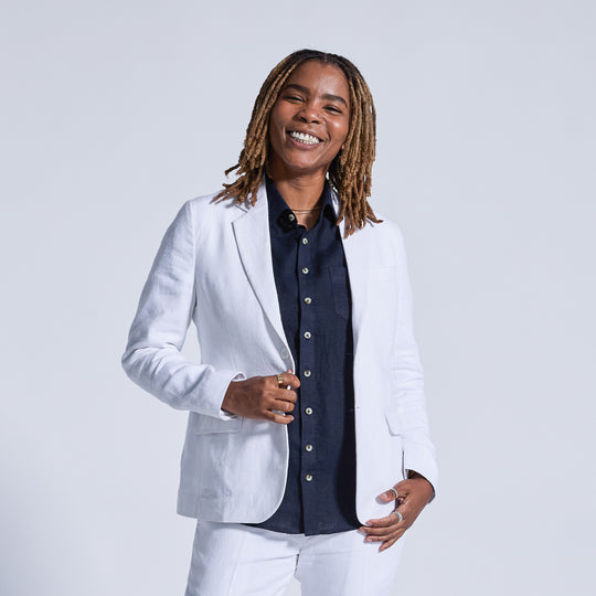 Navy linen shirt paired with White Linen suit by Kirrin Finch