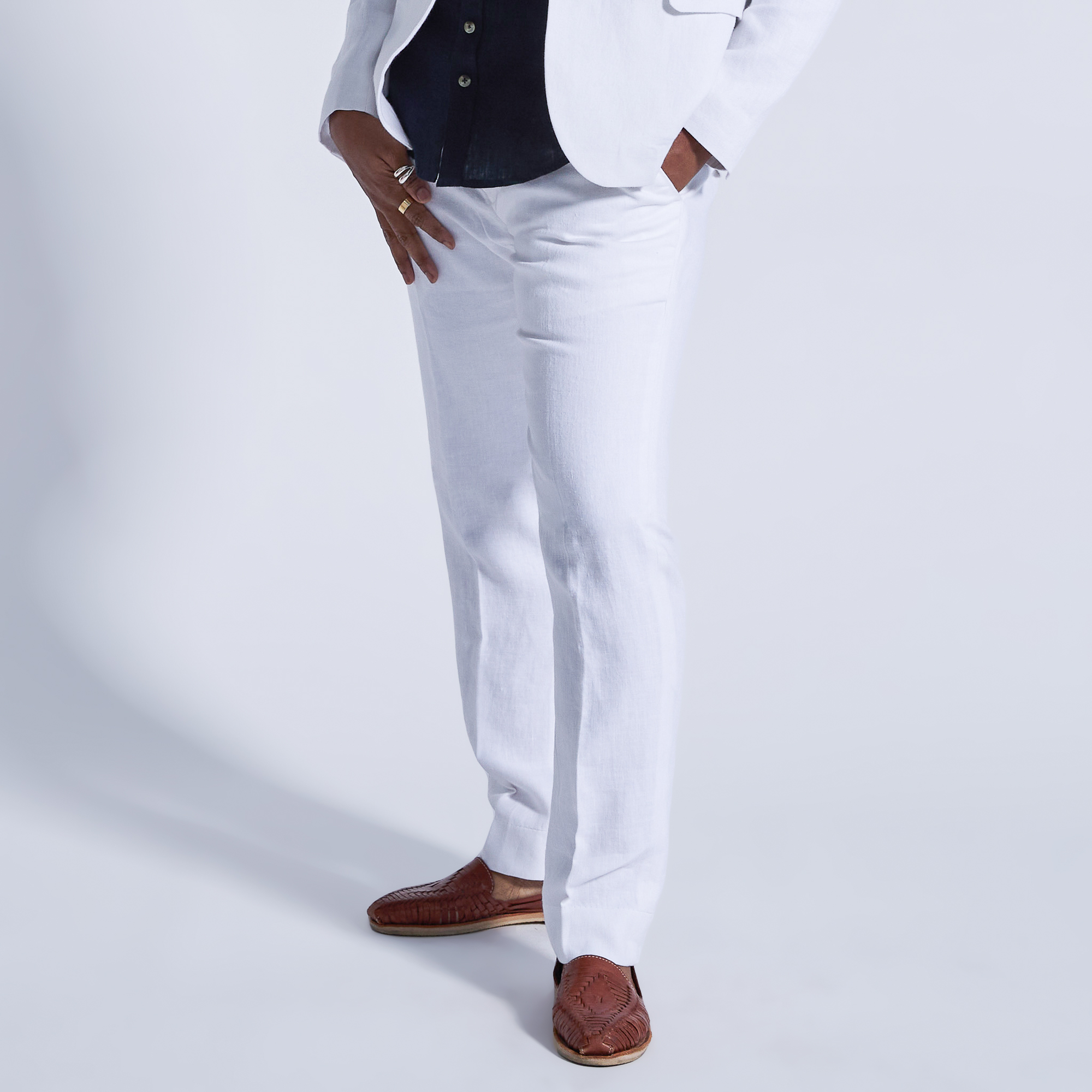 Women's white linen dress pants made by Kirrin Finch.