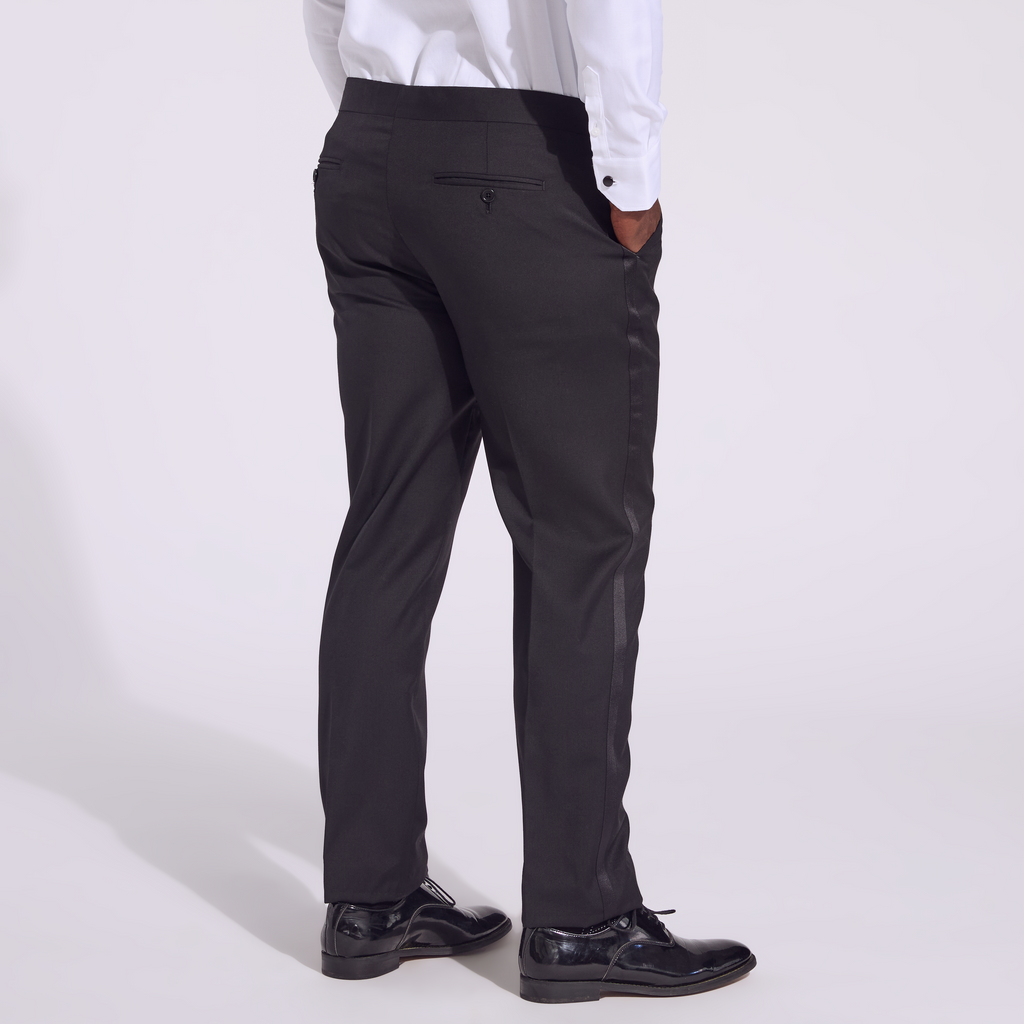 Transmasc model wearing Noir Tuxedo pants by Kirrin Finch