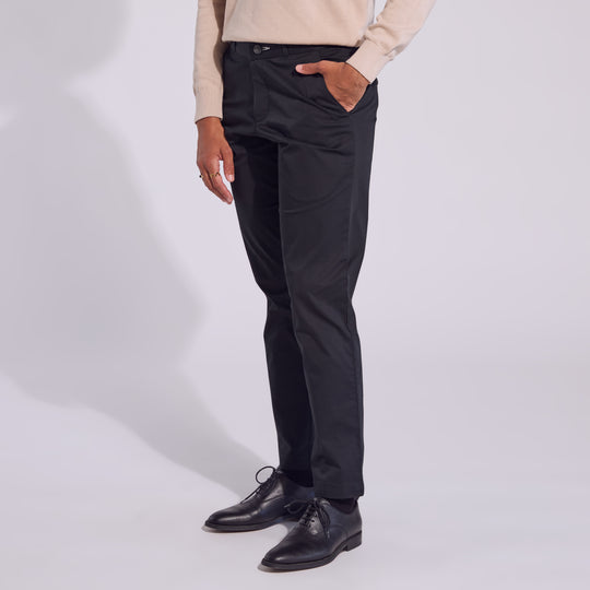 Androgynous black chinos.