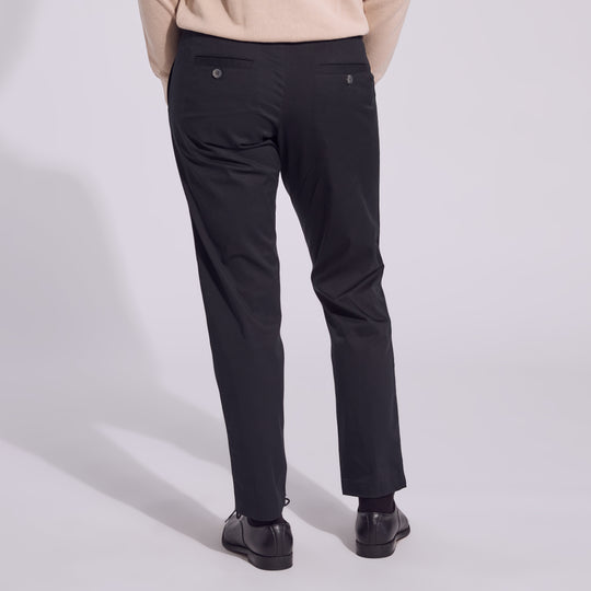 Women's black chinos with subtle taper.