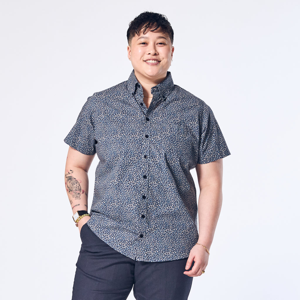 Navy short sleeve button up shirt made for women, trans, masc, and non-binary folk.