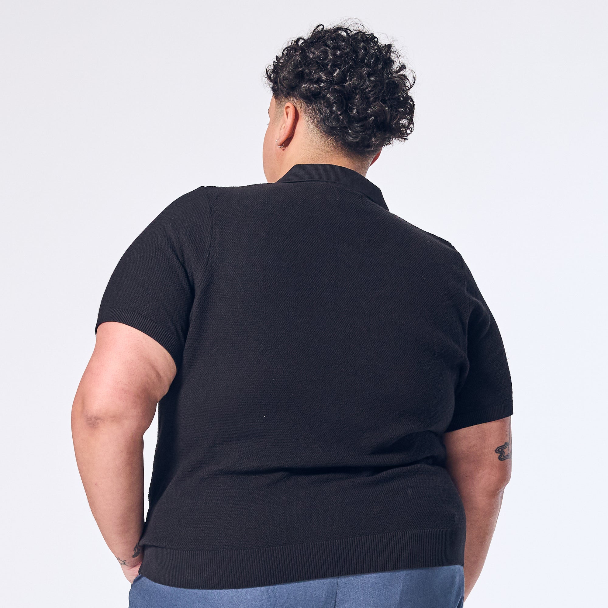 Model wearing Carbon Johnny Collar Polo made by Kirrin Finch.