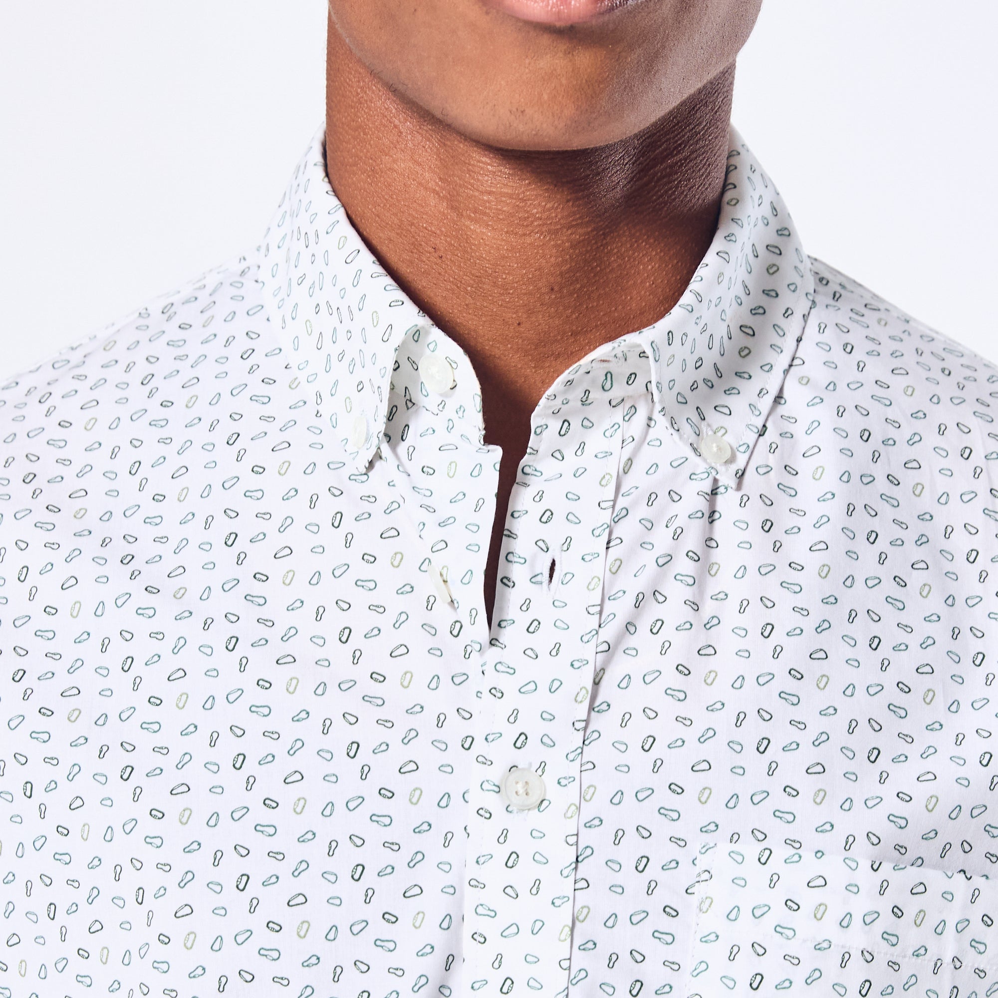 Patterned short sleeved button up shirt featuring white Kirrin Finch logo buttons. Color: Carabiner