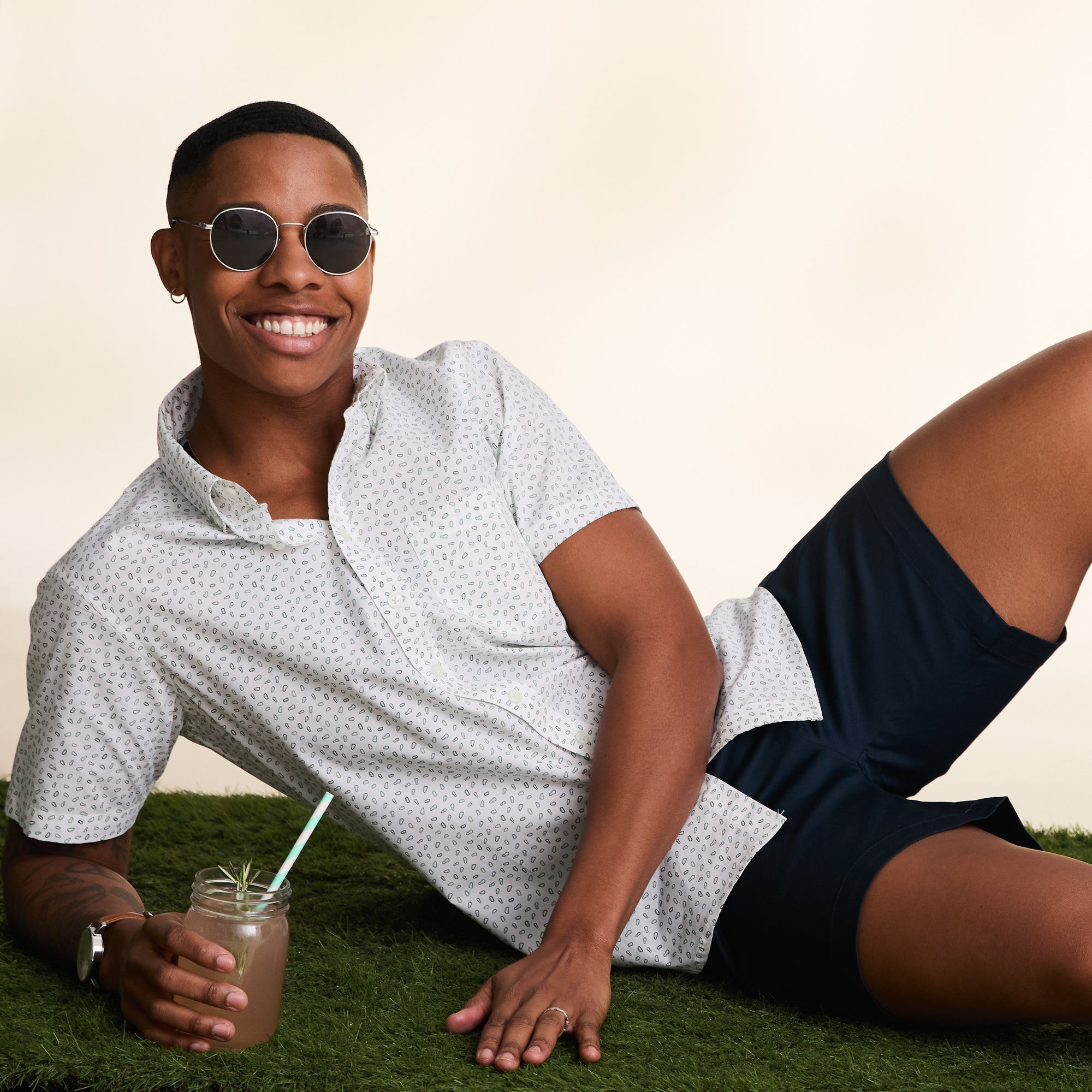 Androgynous short sleeve button down with mini carabiner print.