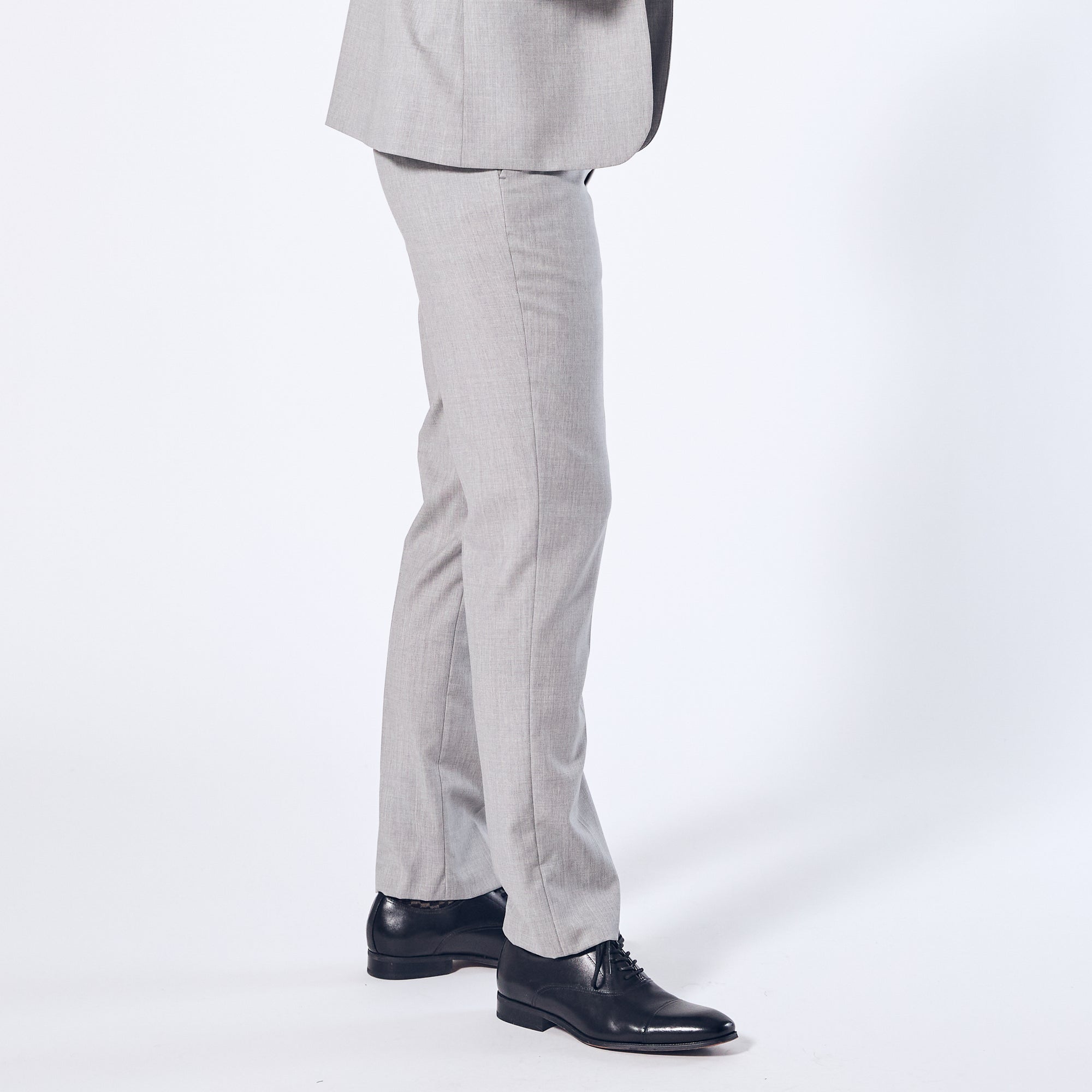 Sky Grey dress pants with subtle taper made by Kirrin Finch. Color: Sky Gray