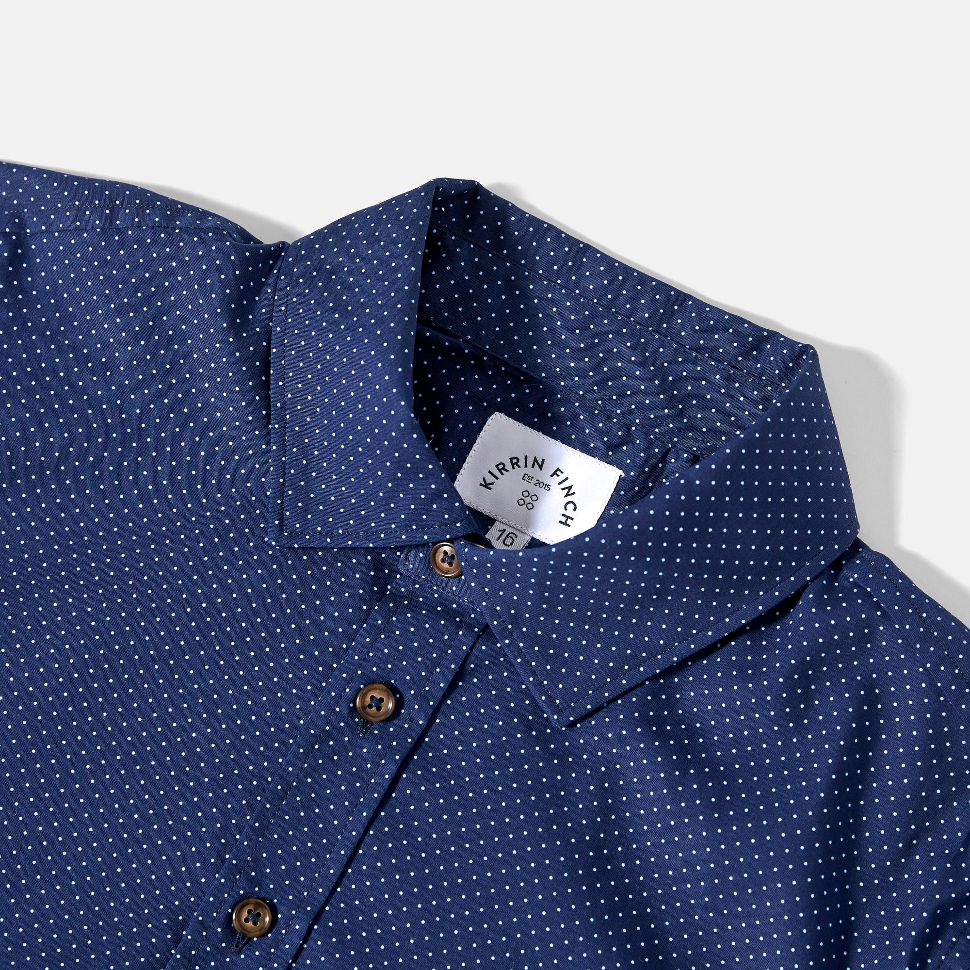 Spread collar and faux horn buttons on Frankie Stella Dress Shirt. Color: Stella
