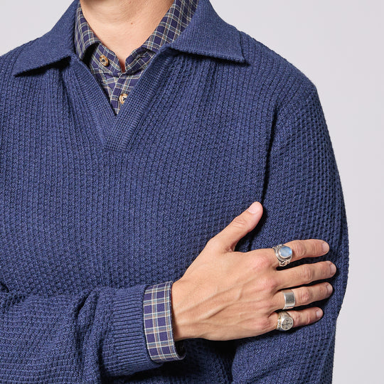 Blue Johnny collar polo featuring ribbed cuffs and hem.