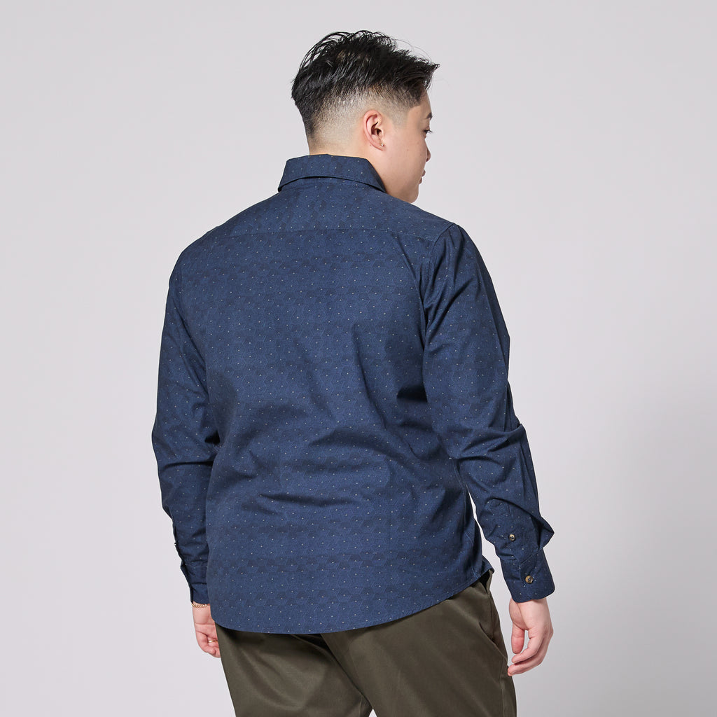 Model wearing Blue Hexagon Point Collar Shirt from behind on a plain background