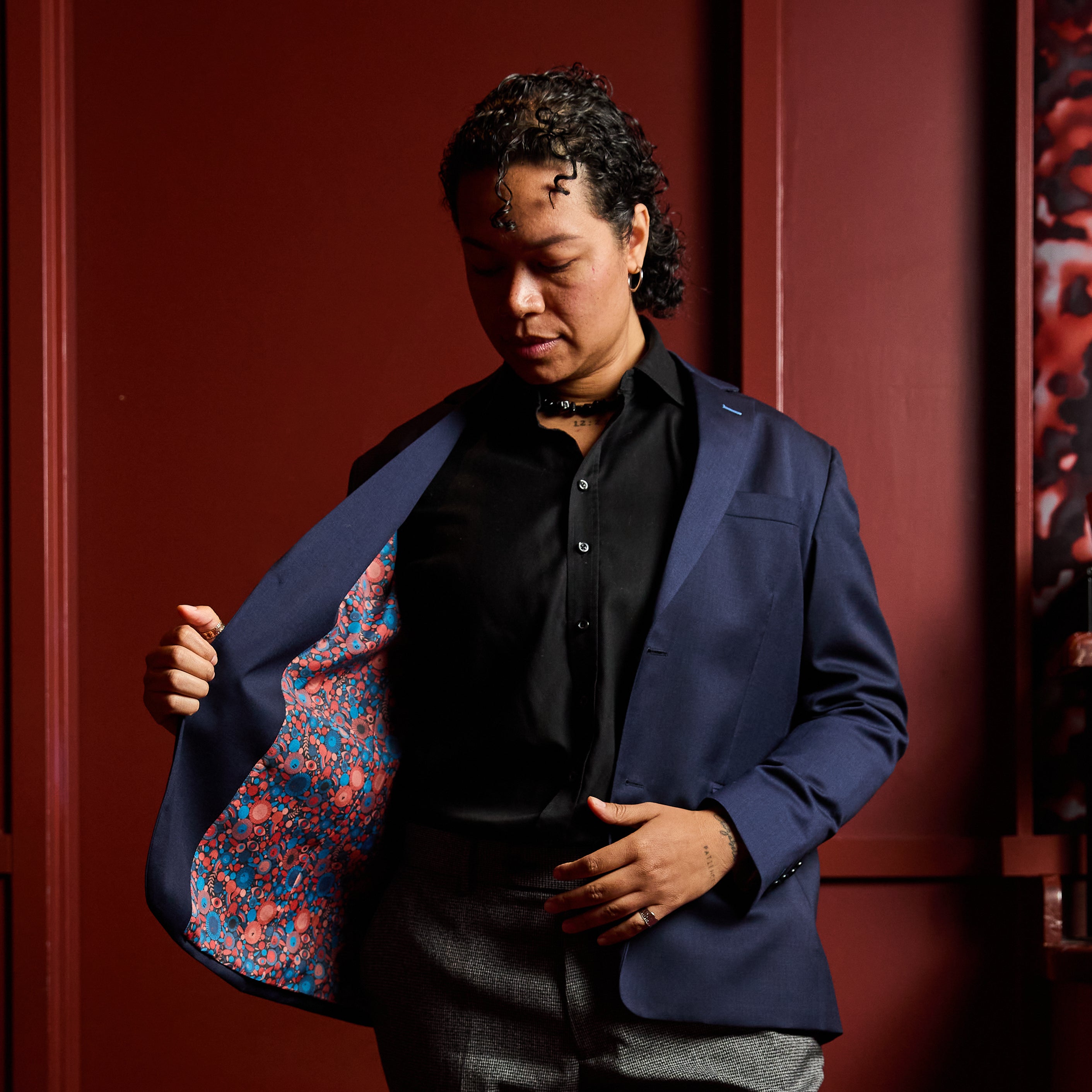 Androgynous person wearing the The Georgie Navy Blazer, Lisa Congdon Edition