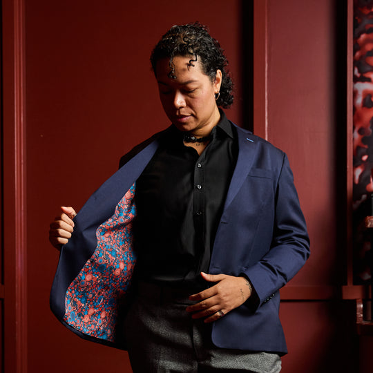 Androgynous person wearing the The Georgie Navy Blazer, Lisa Congdon Edition