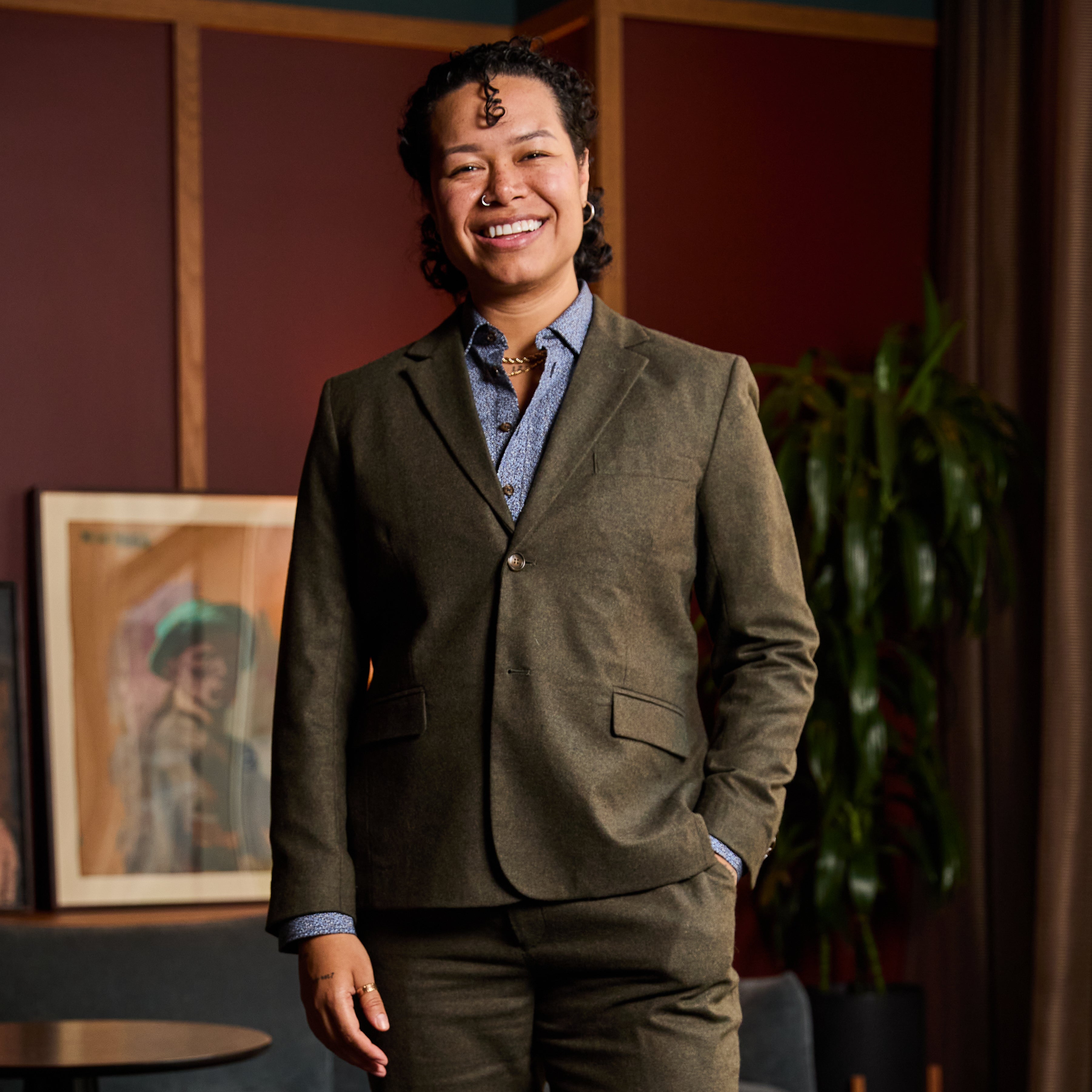 Model wearing The Finch Heather Olive Flannel Suit Blazer made by Kirrin Finch.