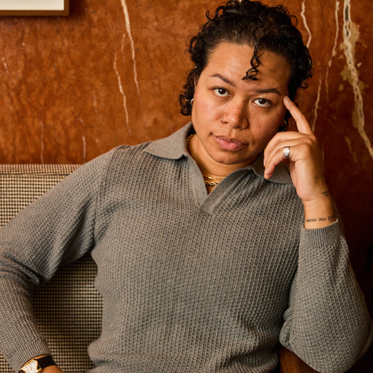 Model wearing ash Johnny collar polo made by Kirrin Finch