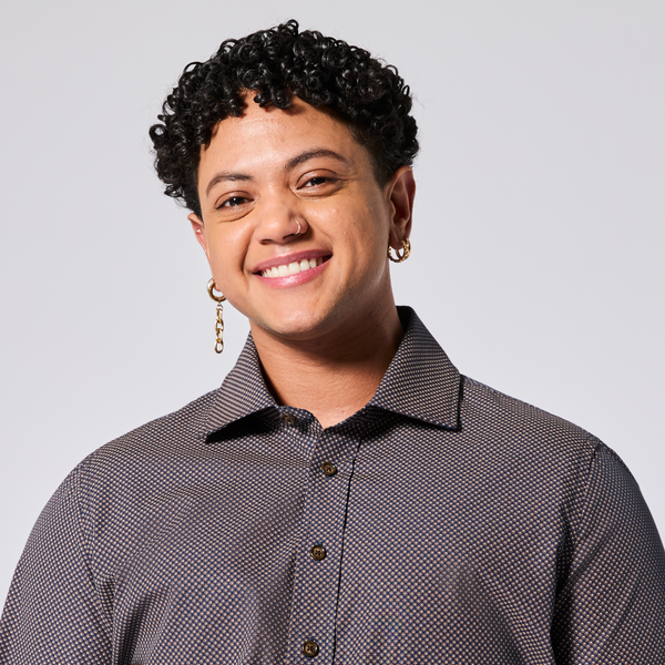 Model wearing a patterned shirt against a plain background. Color: Moroccan Tile