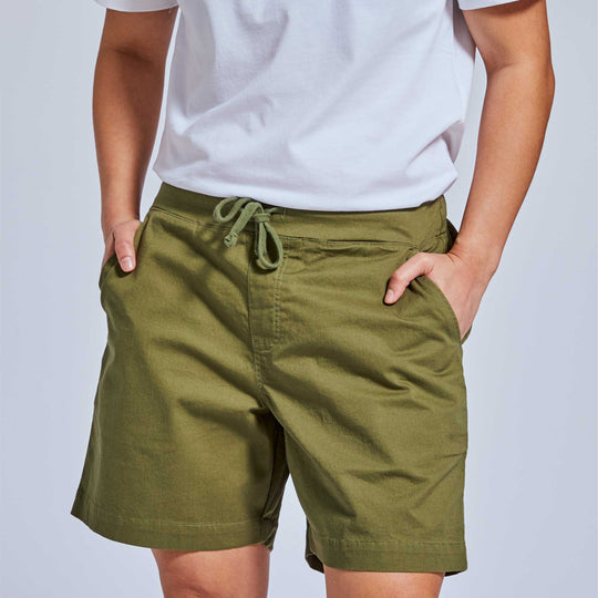 Deep pocket moss green drawstring shorts paired with white t-shirt