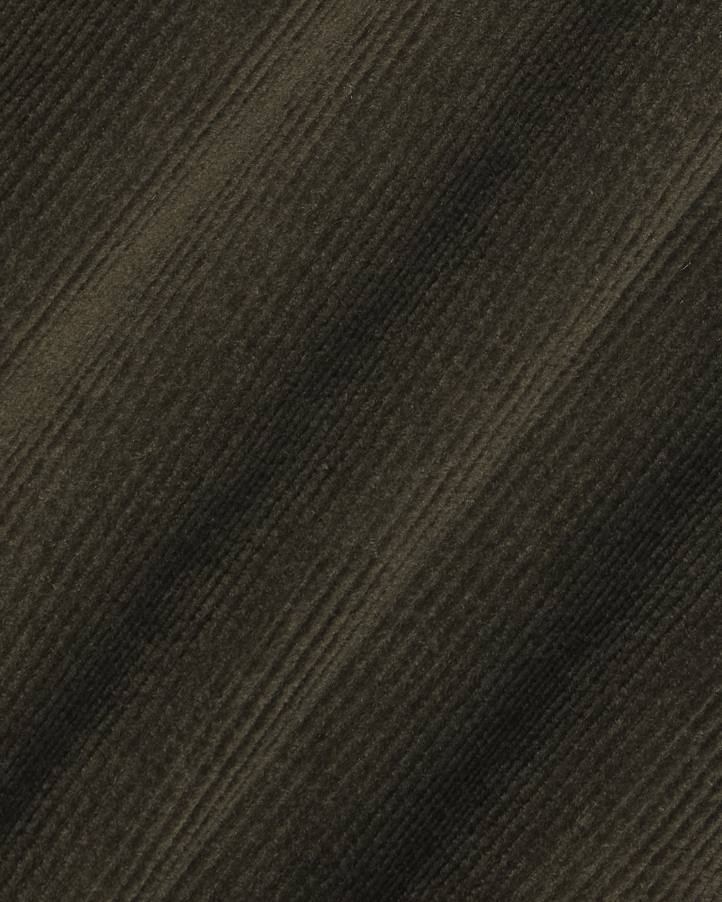 A close-up of a dark brown ribbed fabric texture with diagonal ribbed stripes. Color: Pine