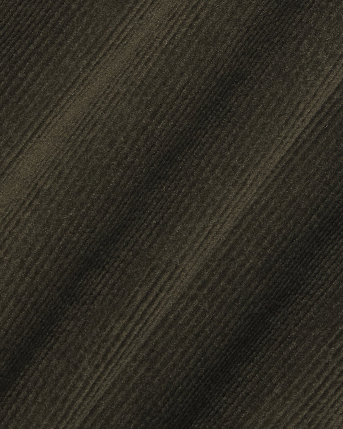 A close-up of a dark brown ribbed fabric texture with diagonal ribbed stripes. Color: Pine