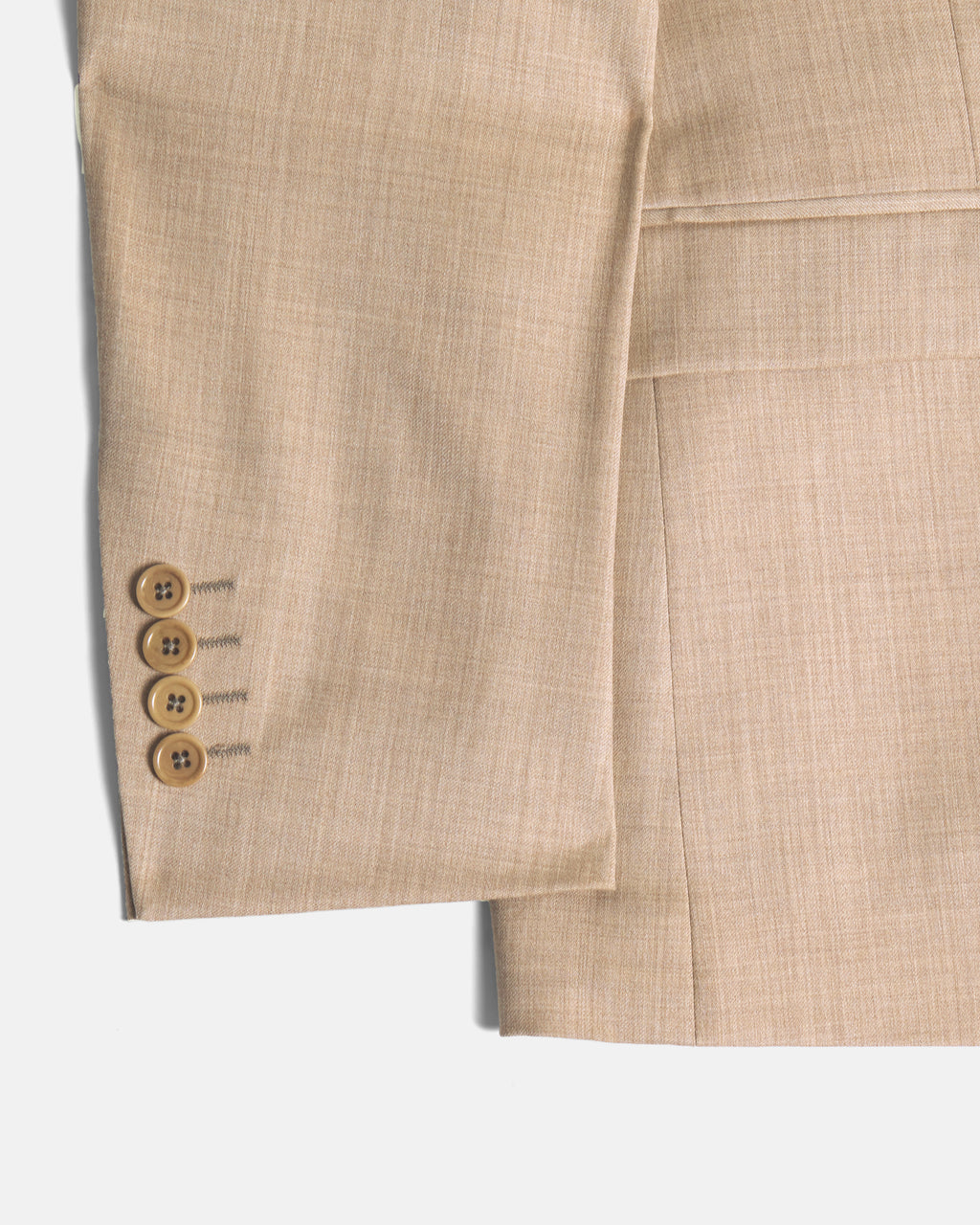 Close-up of a beige suit with buttons on a white background. Color: Desert