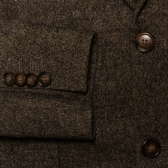 Brown faux buttons on Pebble blazer