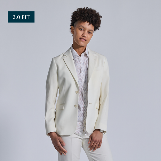 Non-binary model in Ivory Wedding Suit by Kirrin Finch