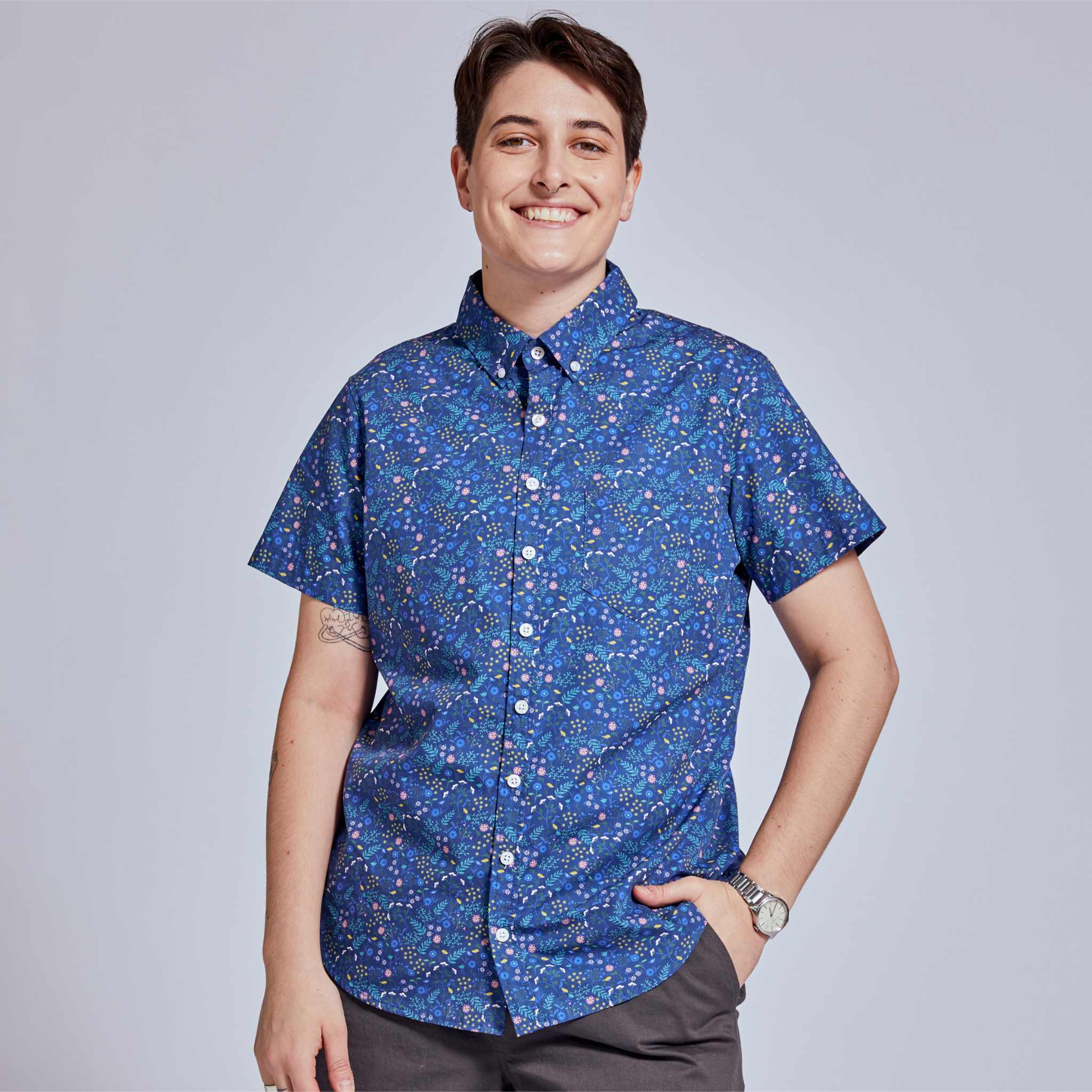 Androgynous short sleeve button-up shirt in blue floral print