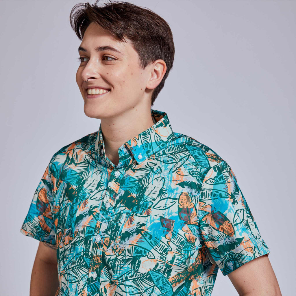 Non-Binary model in androgynous short sleeve shirt