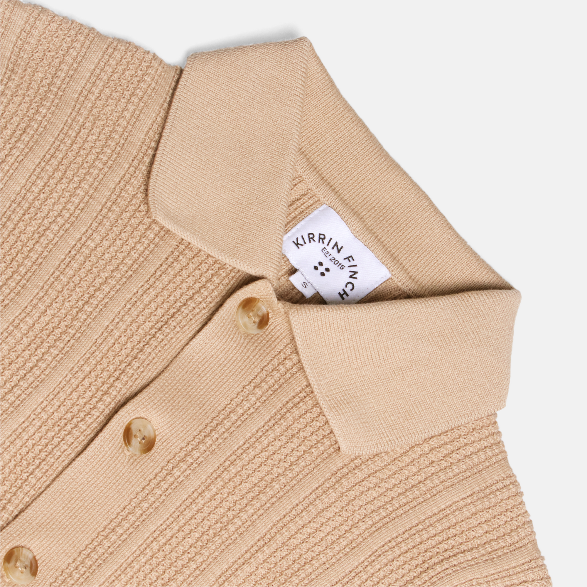 Androgynous green knitted cardigan on a light gray background. Color: Camel