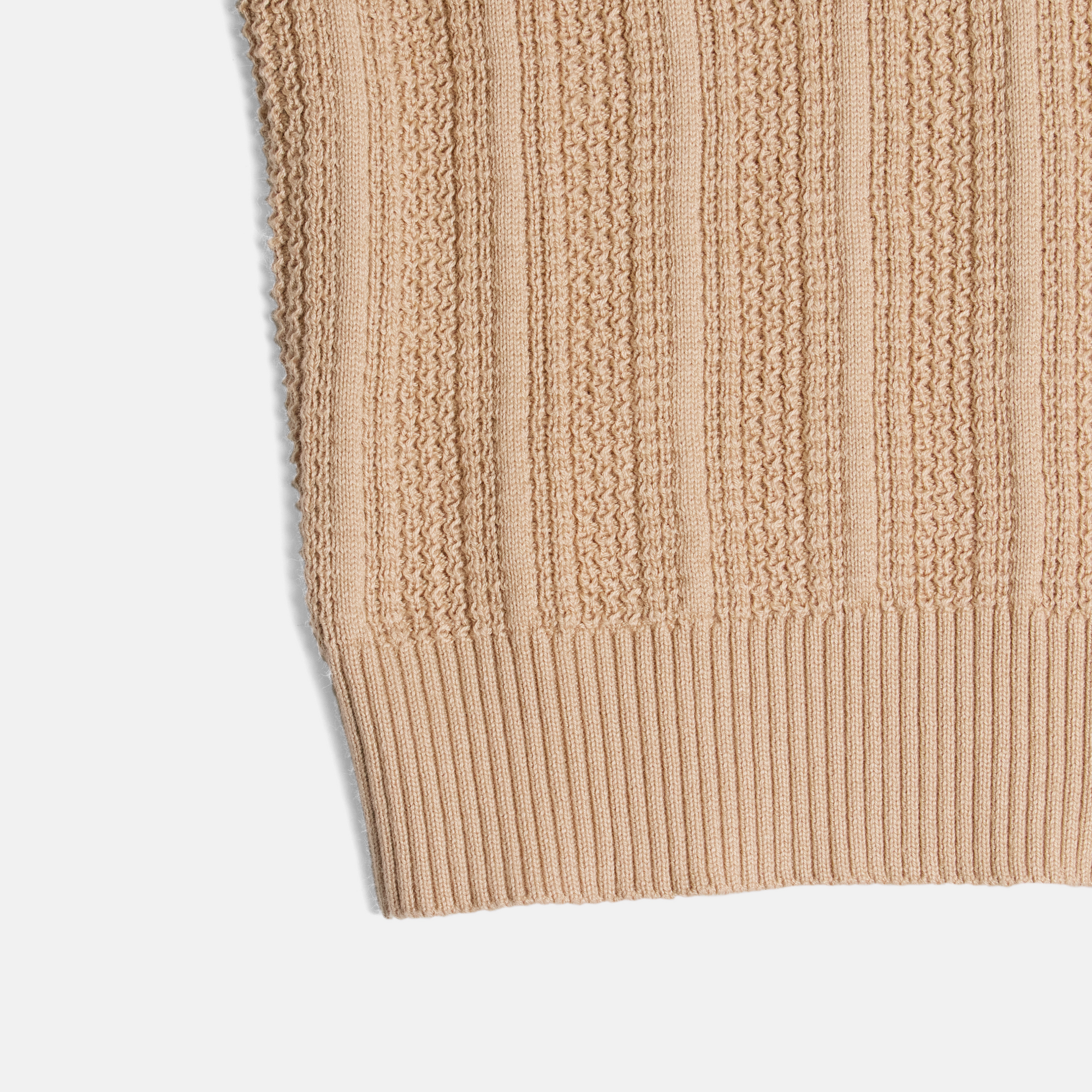 Ribbed cuff of camel cardigan made by Kirrin Finch.  Color: Camel