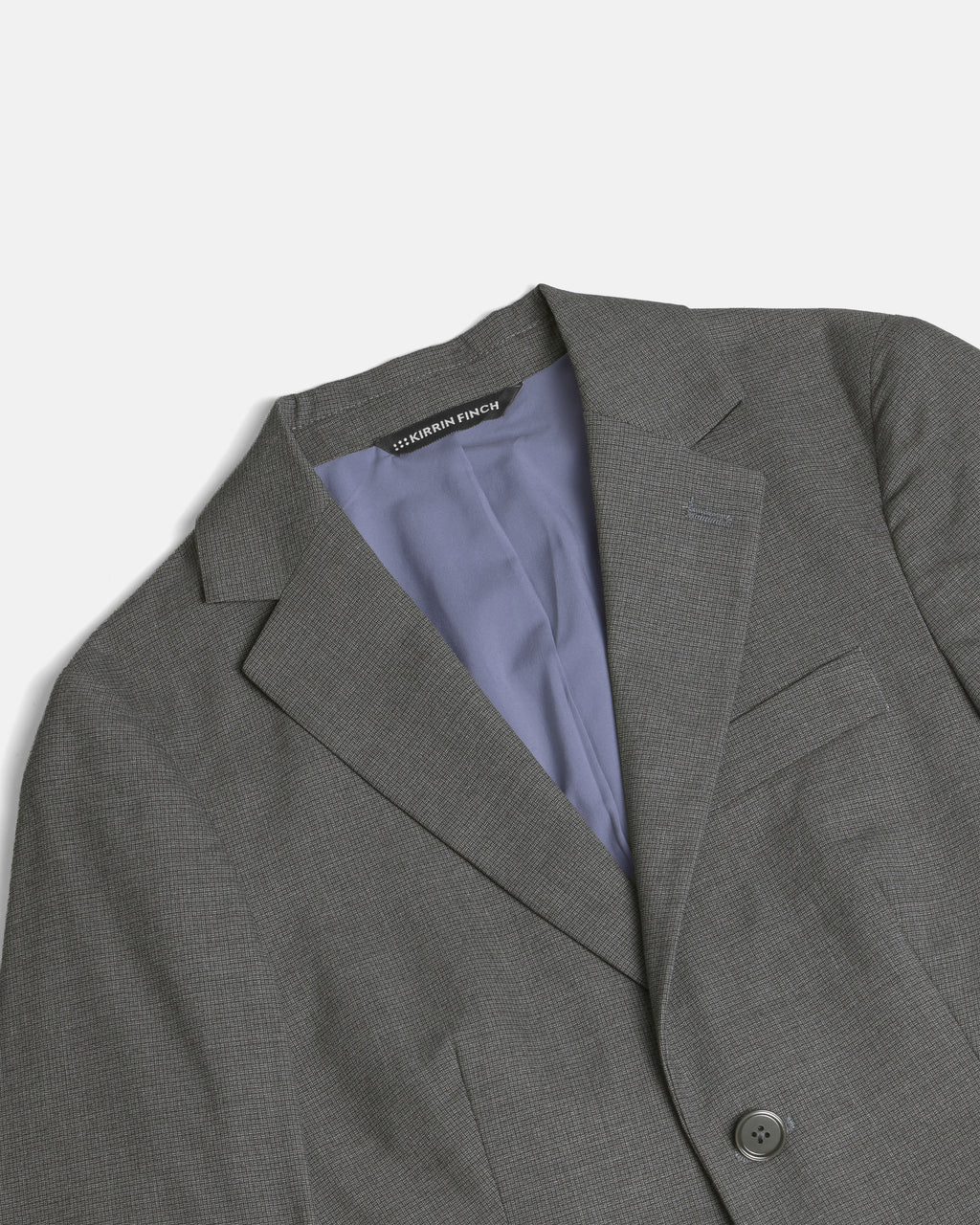 Gray blazer with a Kirrin Finch label on a light gray background. Color: Gray Lattice