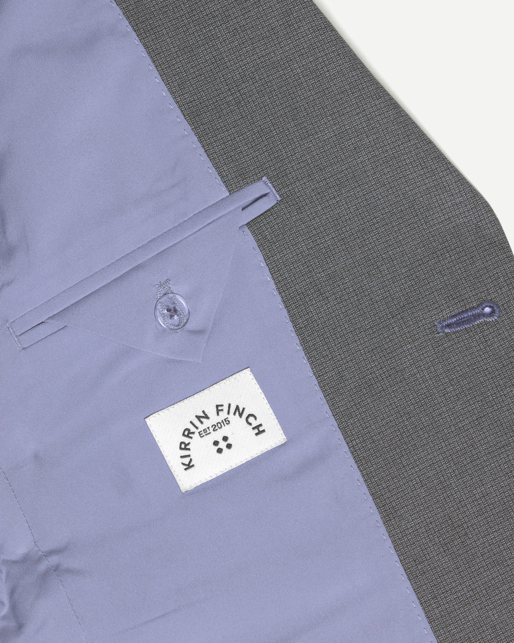Close-up of the inner pocket of the scout blazer. Color: Gray Lattice