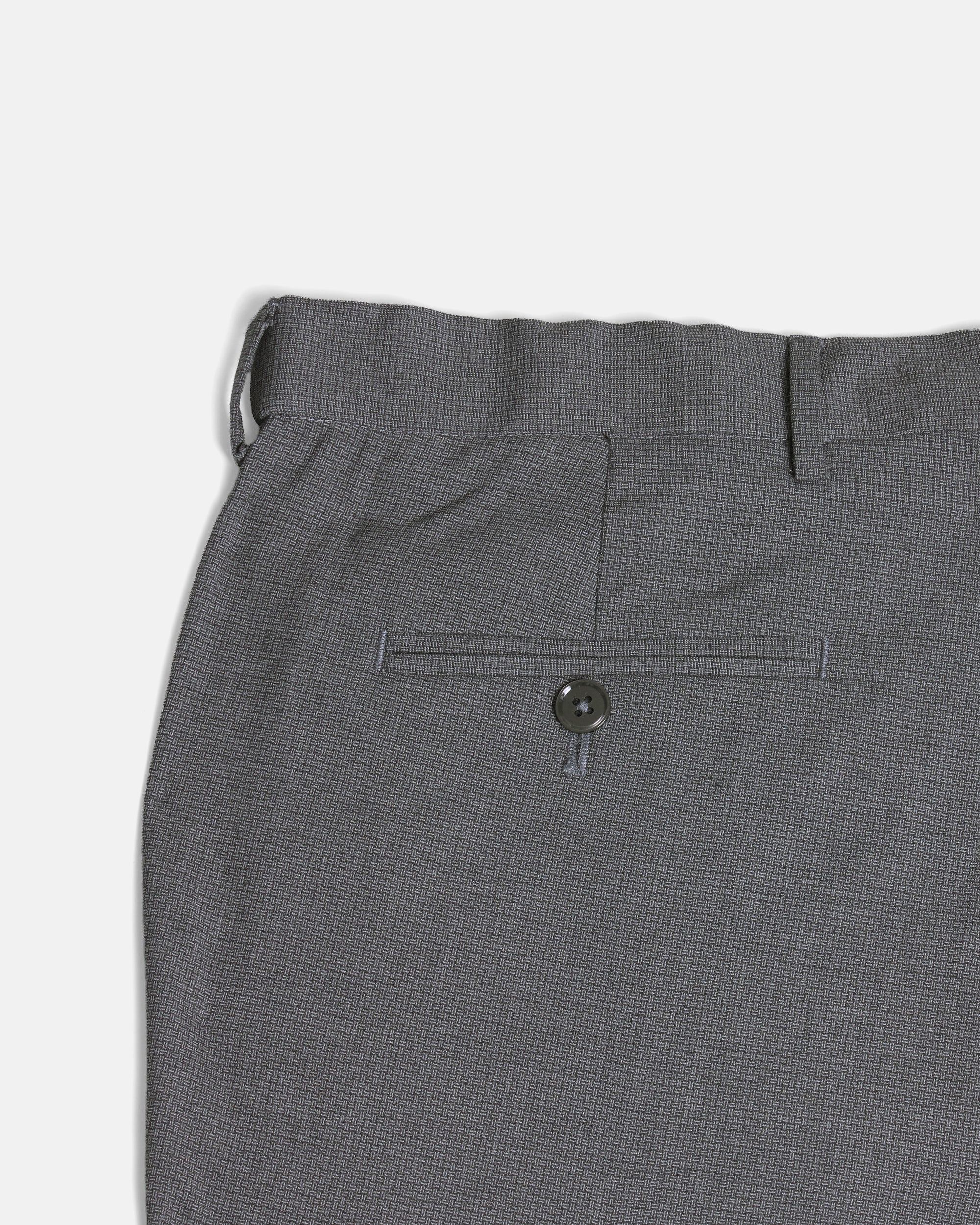 Close-up of gray patterned pants on a light gray background. Color: Gray Lattice