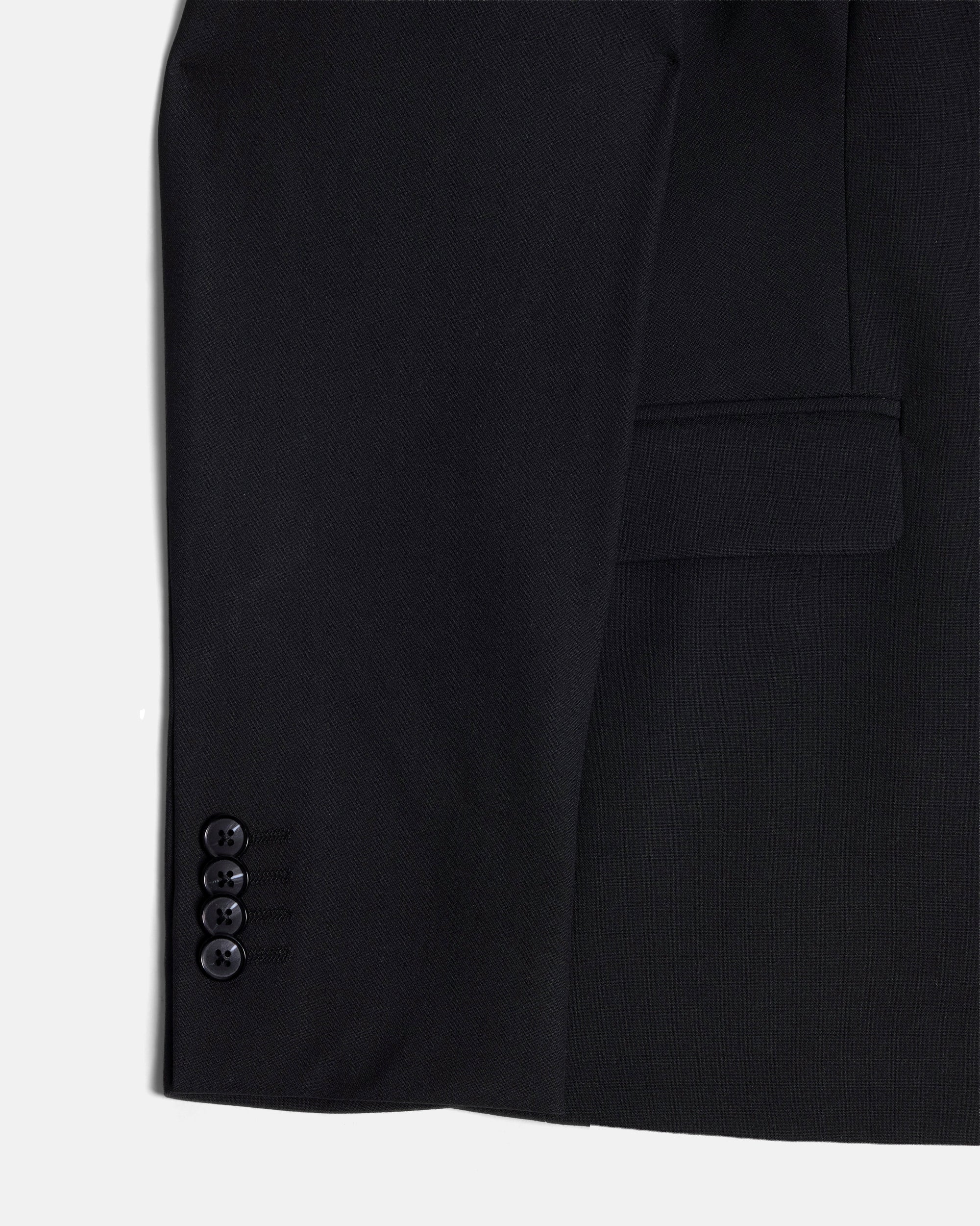 Close up of cuff buttons on the black Scout blazer Color: Obsidian