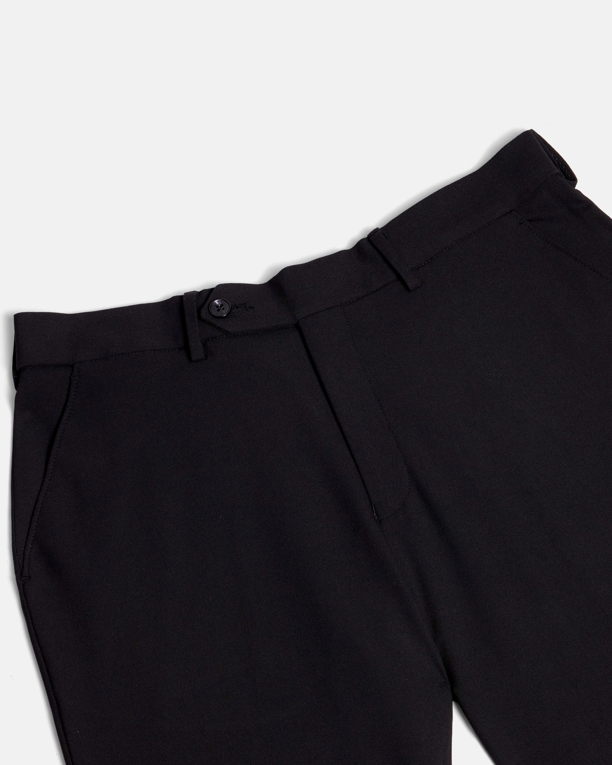 Black pants laid on a white background. Color: Obsidian