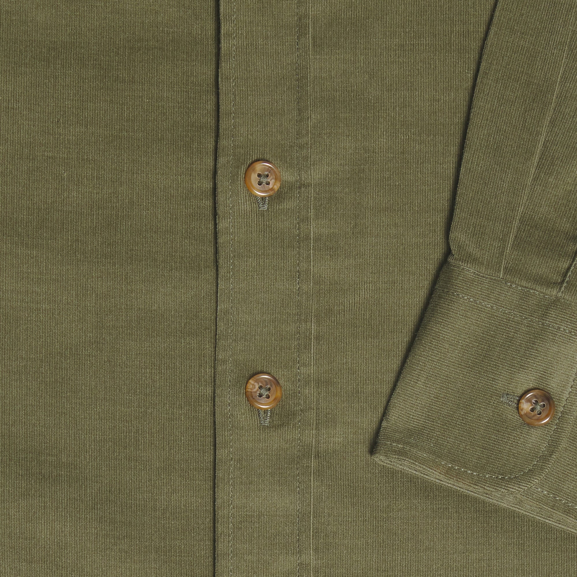 Close-up of an olive green textured button-up shirt showing the button placket and a cuff with brown buttons. Color: Turtle Corduroy