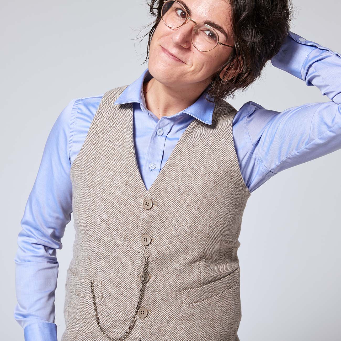 Androgynous taupe herringbone tweed vest for non-binary folk