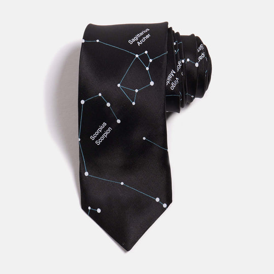 Black Skinny Tie with a constellation print by Kirrin Finch. It has been rolled and slightly pulled so how its layers