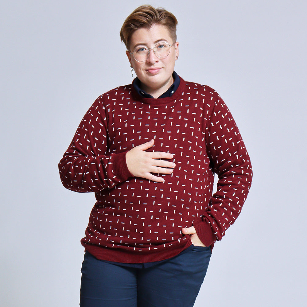 Androgynous model wearing Burgundy Sweater with white dashes